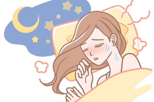 睡眠不足の女性 夜の暑さにうなされる
